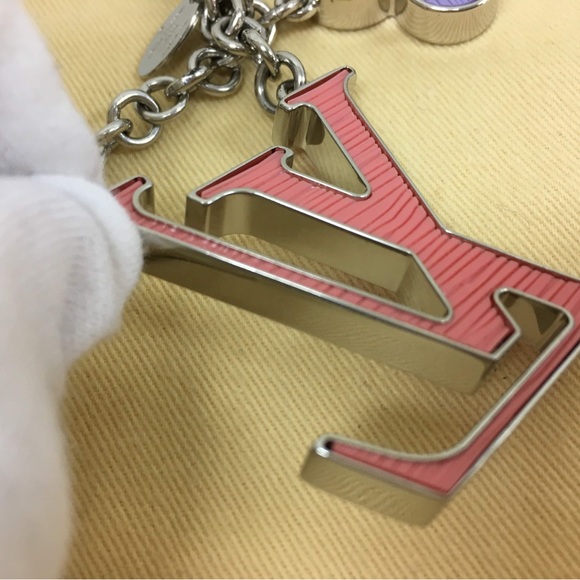 Authentic Louis Vuitton FLEUR D'EPI BAG
CHARM. - Picture 6 of 10